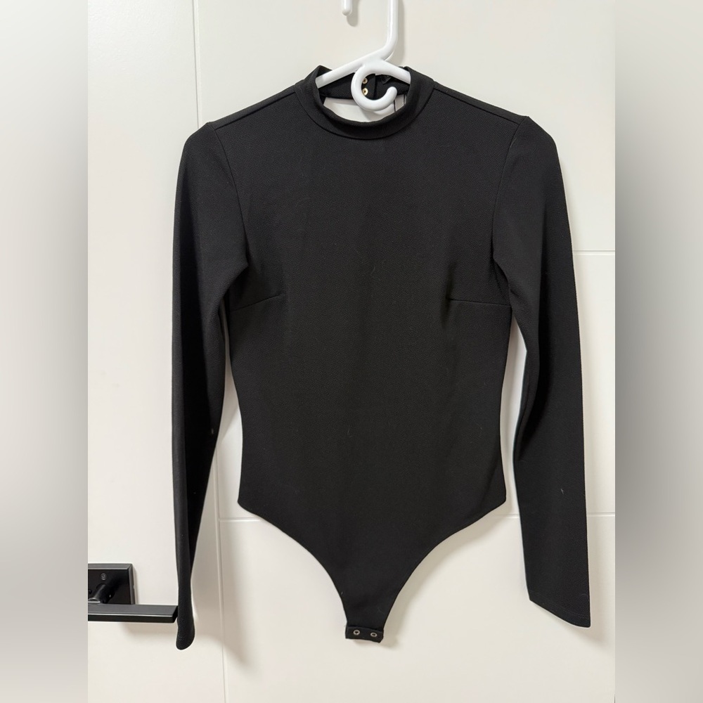 Black Dynamite bodysuit with open back